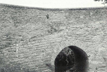 East face of Arch 10 before repair showing line of causeway approach